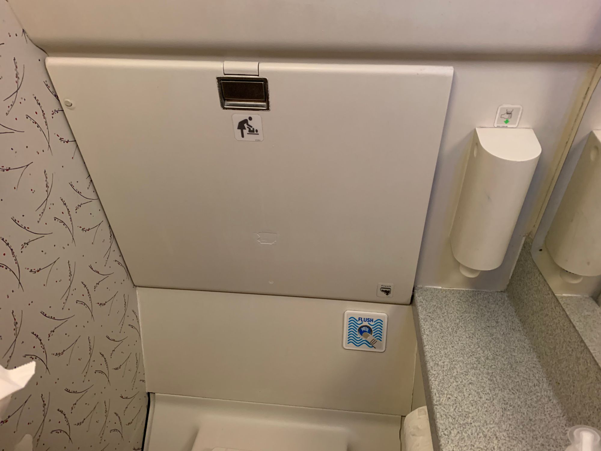 Diaper Or Nappy In An Airplane Bathroom, Airplane Bathroom Changing Table