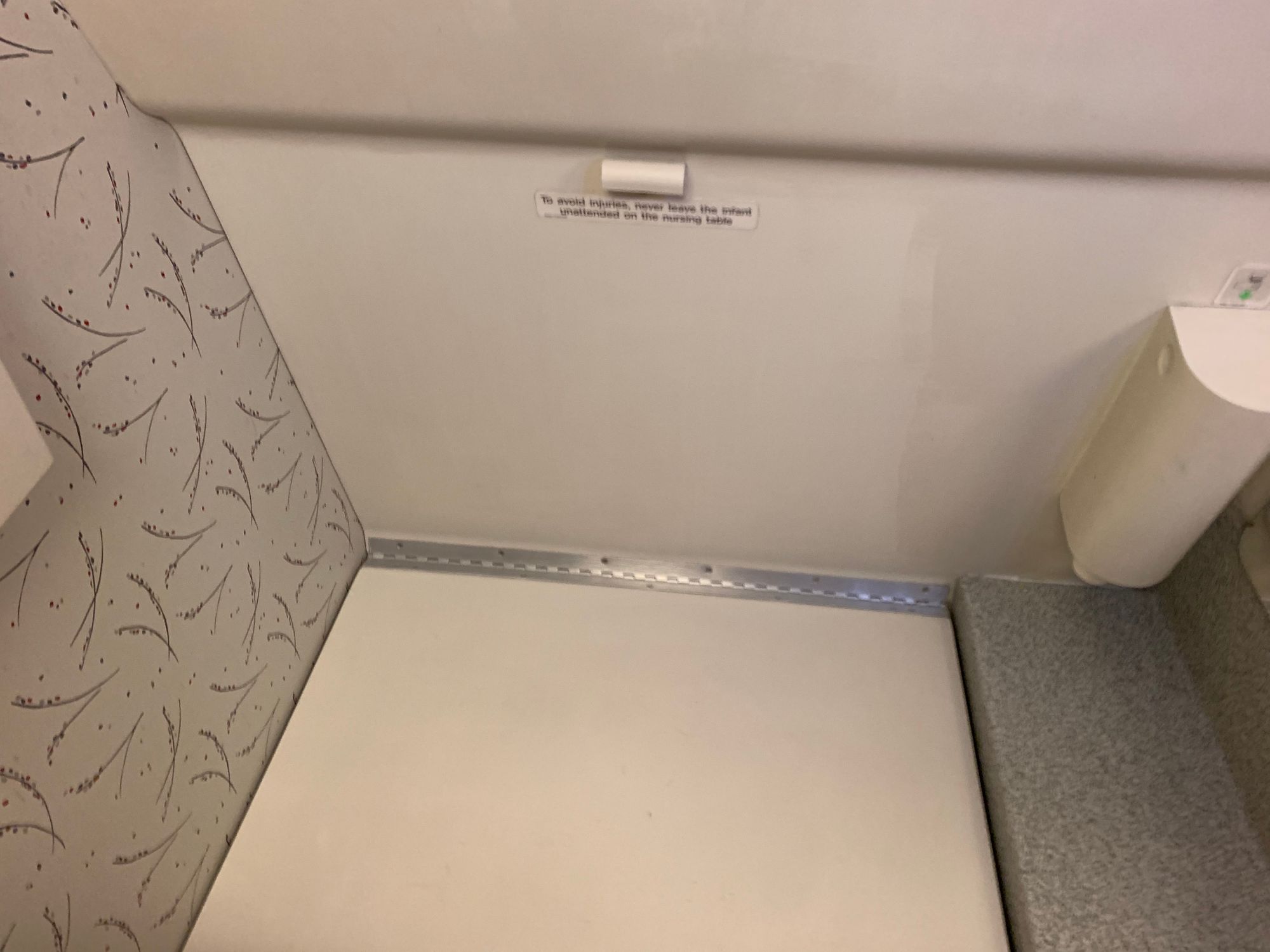 How to Change a Diaper in an Airplane Bathroom